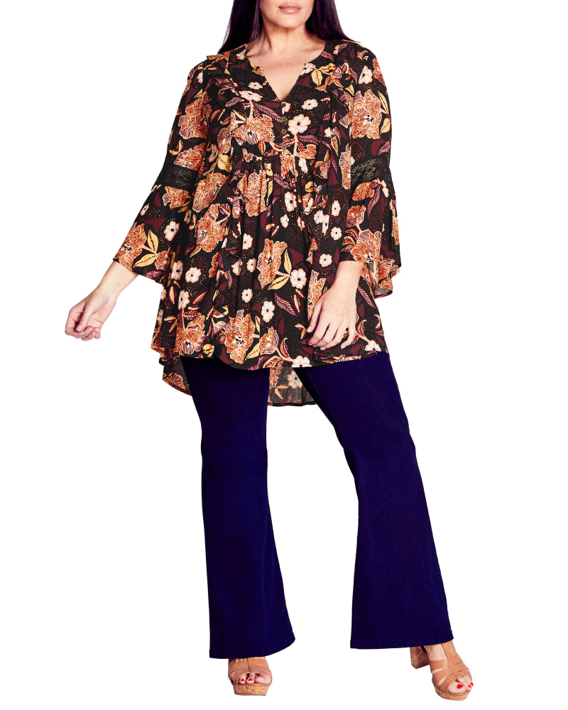 Front of a model wearing a size 18 TUNIC ALLEGRA RUFFLE in Batik Beauty by Aveology. | dia_product_style_image_id:302864
